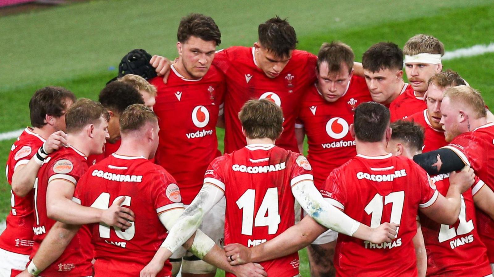Wales players successful a huddle astatine Principality Stadium