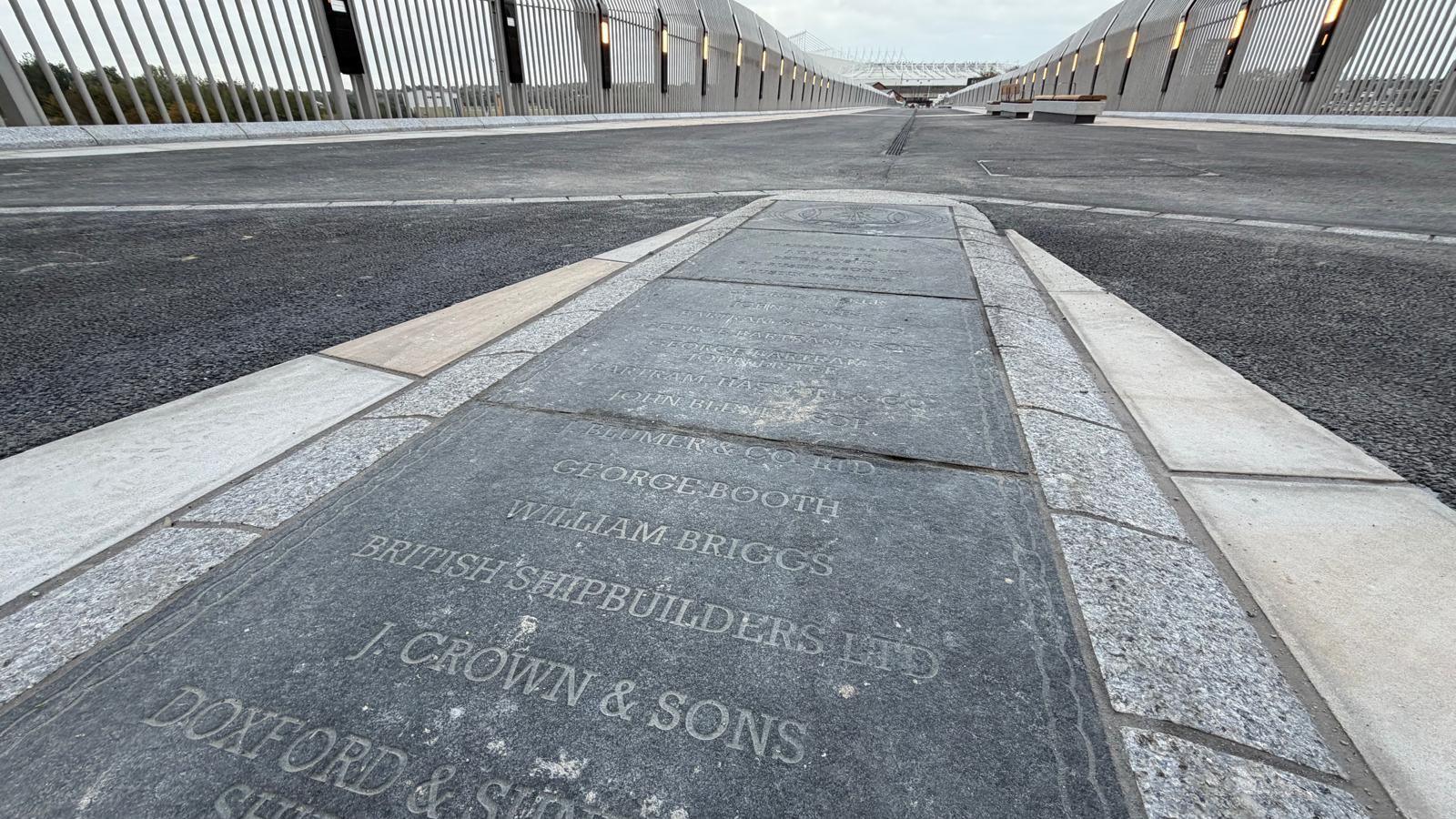 Several names of former ships and shipyards once based on Wearside are engraved on flagstones which run approximately a quarter of the way onto the bridge.