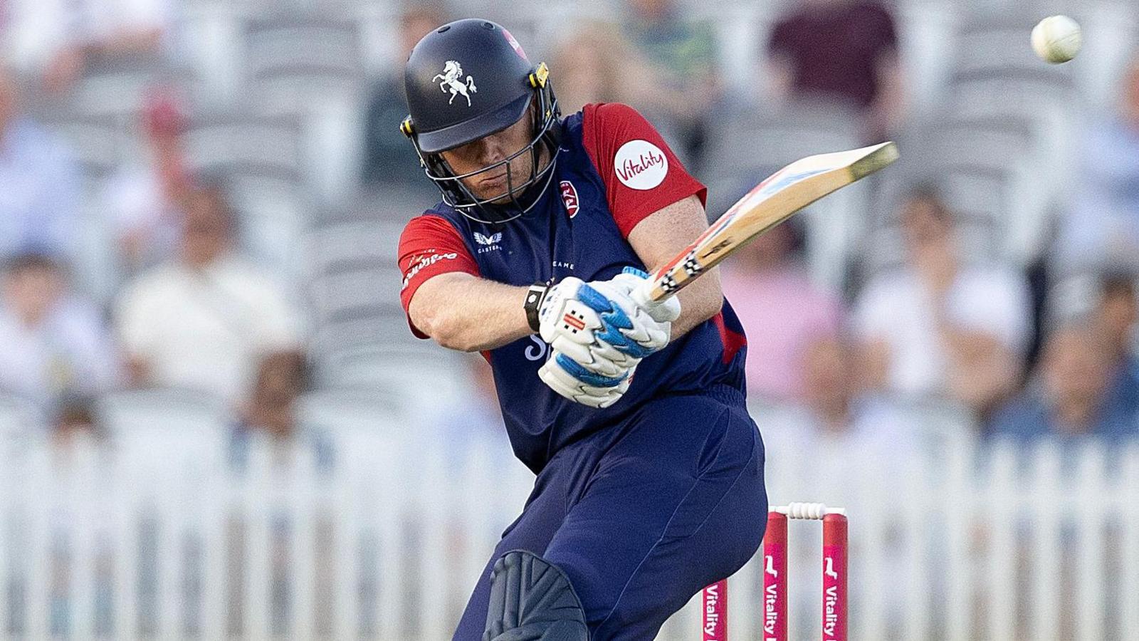 Kent's Sam Billings, in their blue T20 strip, pulls a ball