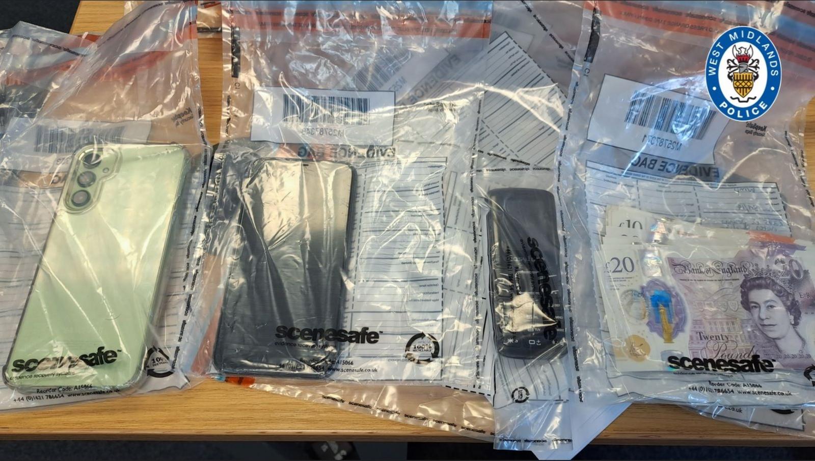 Three phones and cash in police evidence bags