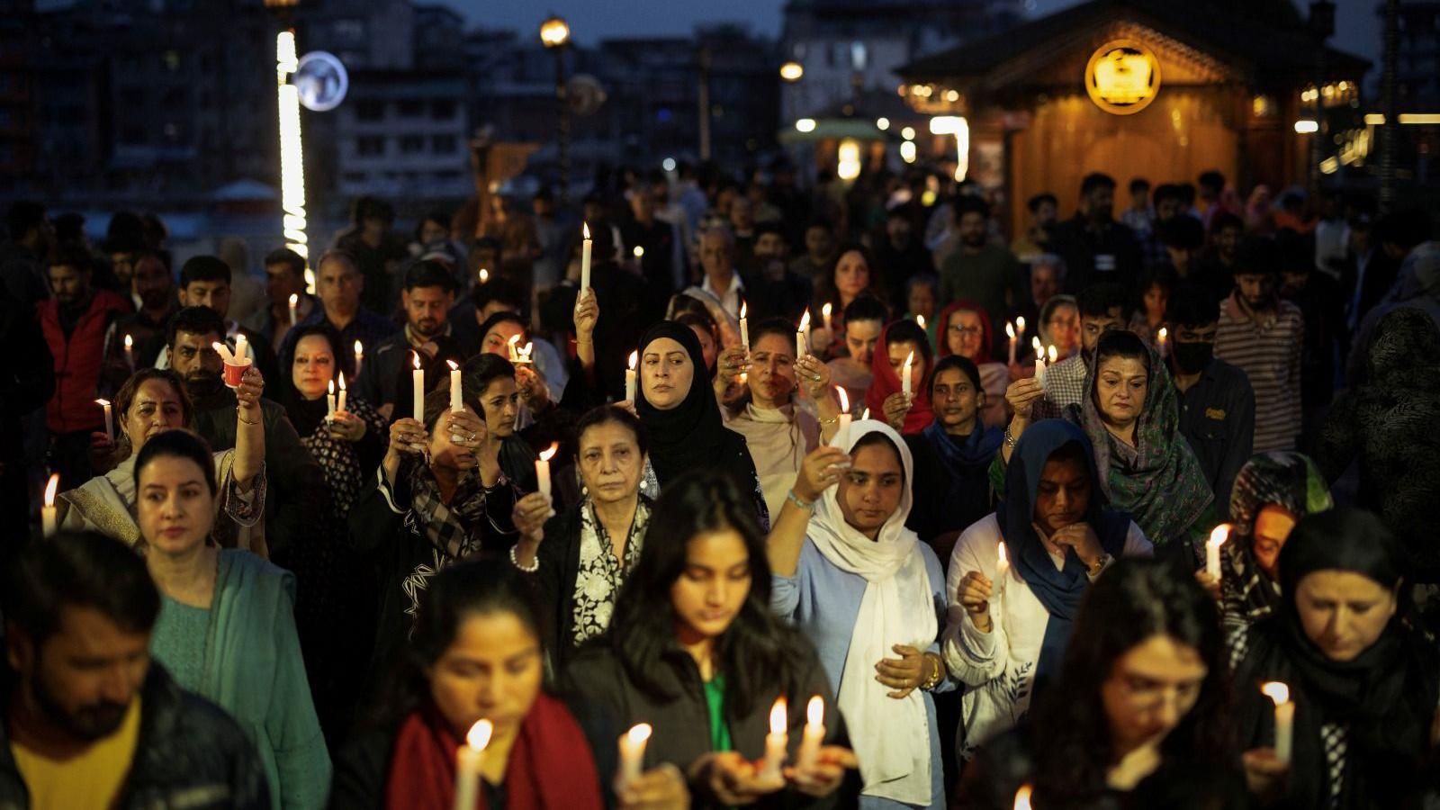 Demonstrators hold a candle light vigil to condemn a suspected militant attack on tourists near south Kashmir’s scenic Pahalgam, in Srinagar April 23, 2025. REUTERS/Adnan Abidi