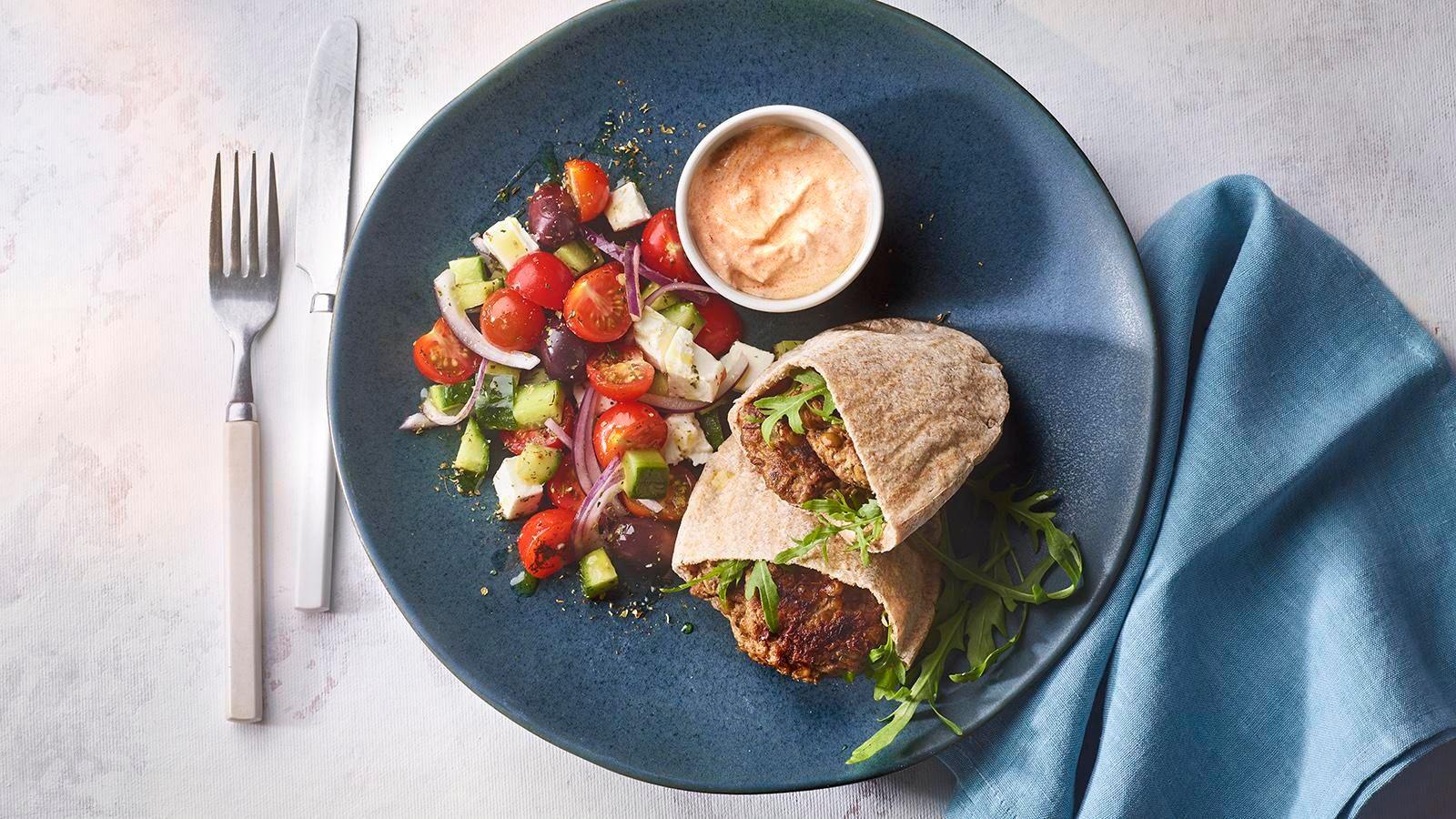 Lamb and lentil burgers with Greek salad