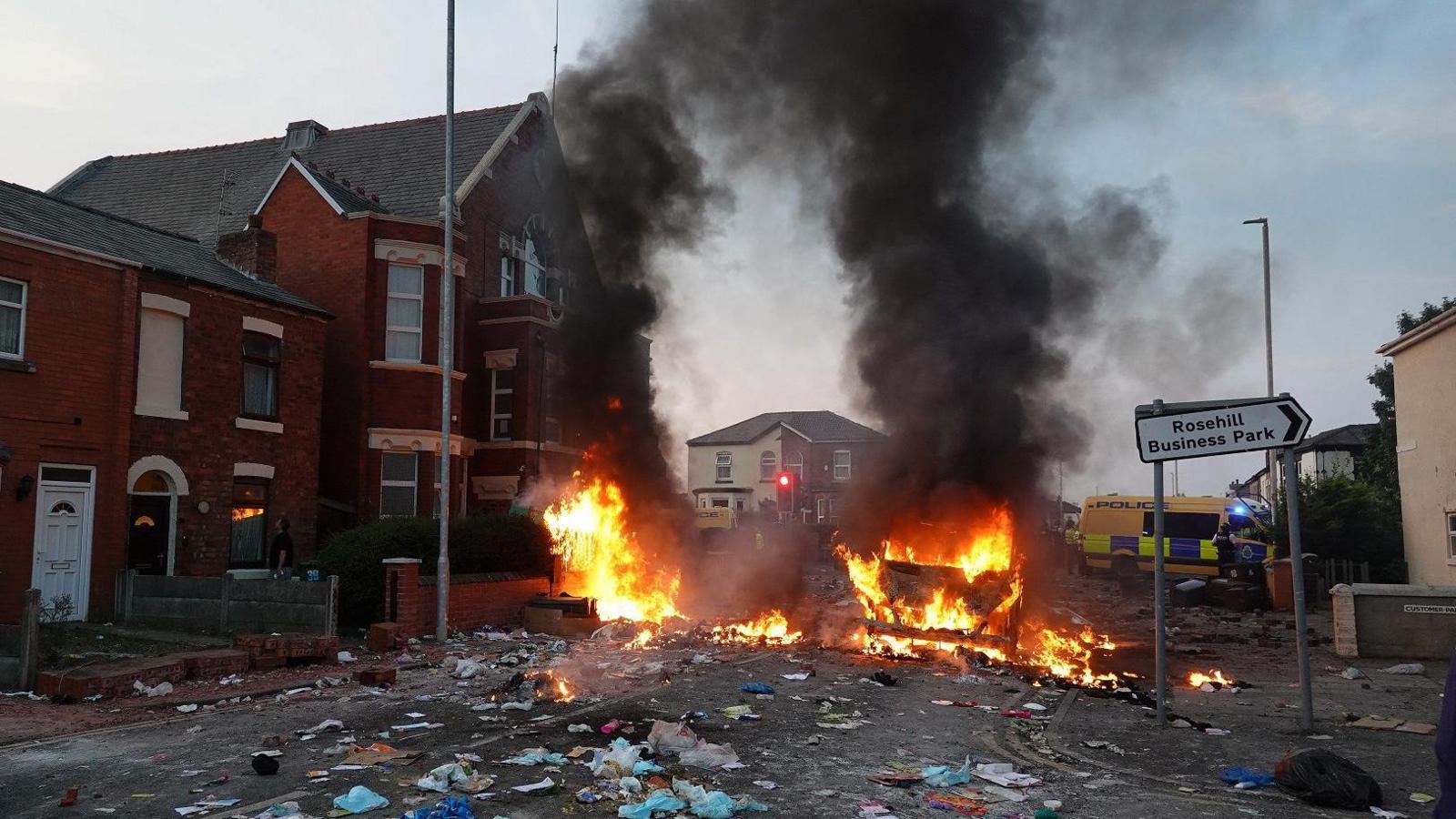 fire and rubbish during a riot outside Southport mosque