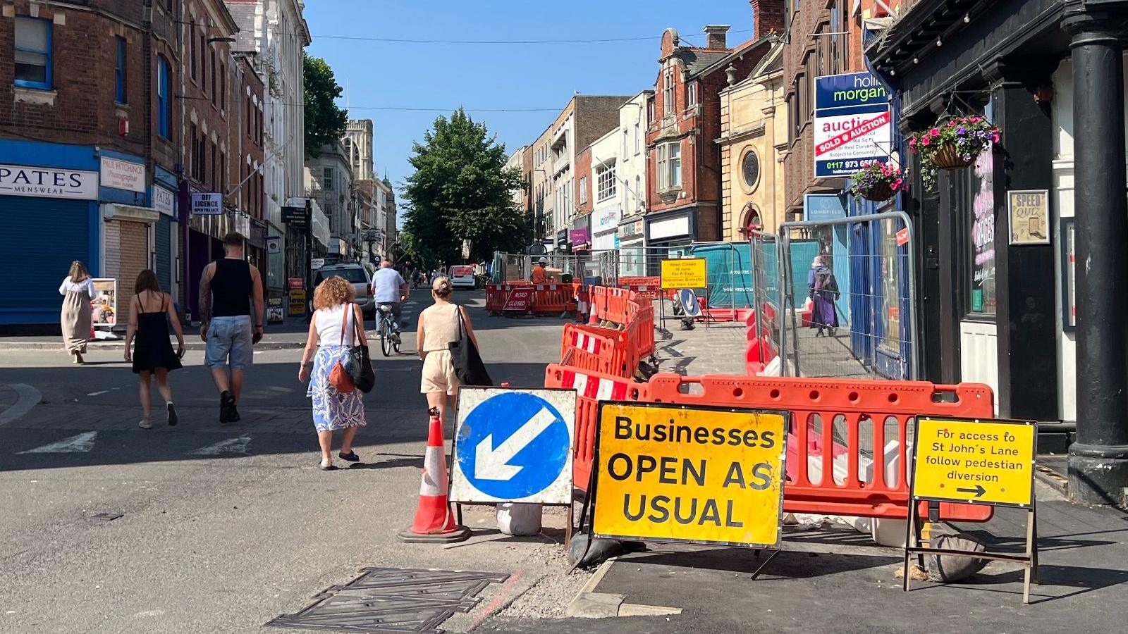 The centre of Gloucester, part of which is cordoned off behind orange barriers to allow for work on the cycle lane to be completed.