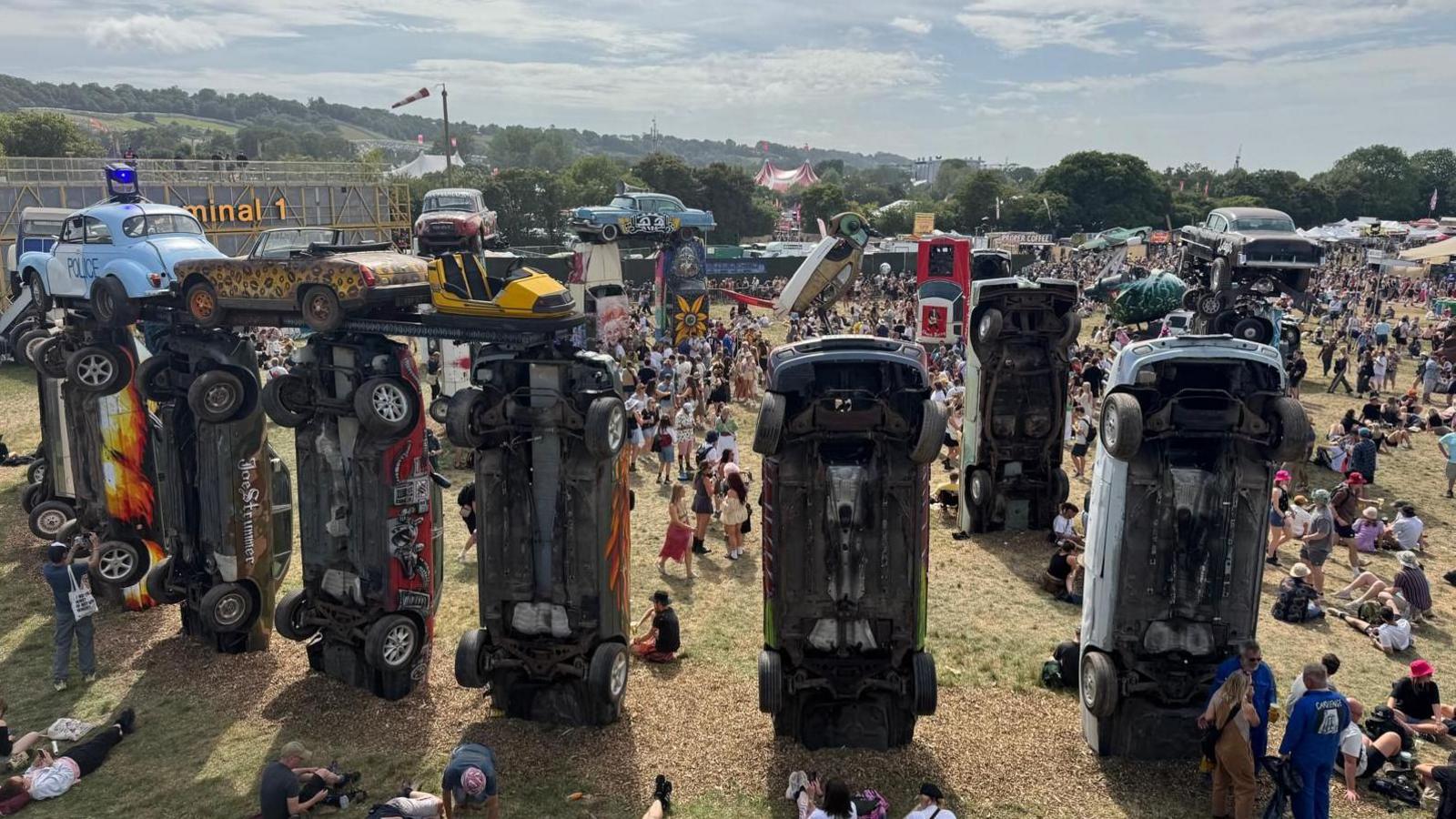 Carhenge, which is a sculptural artwork made of 24 vintage cars stood upright on their bonnets.
