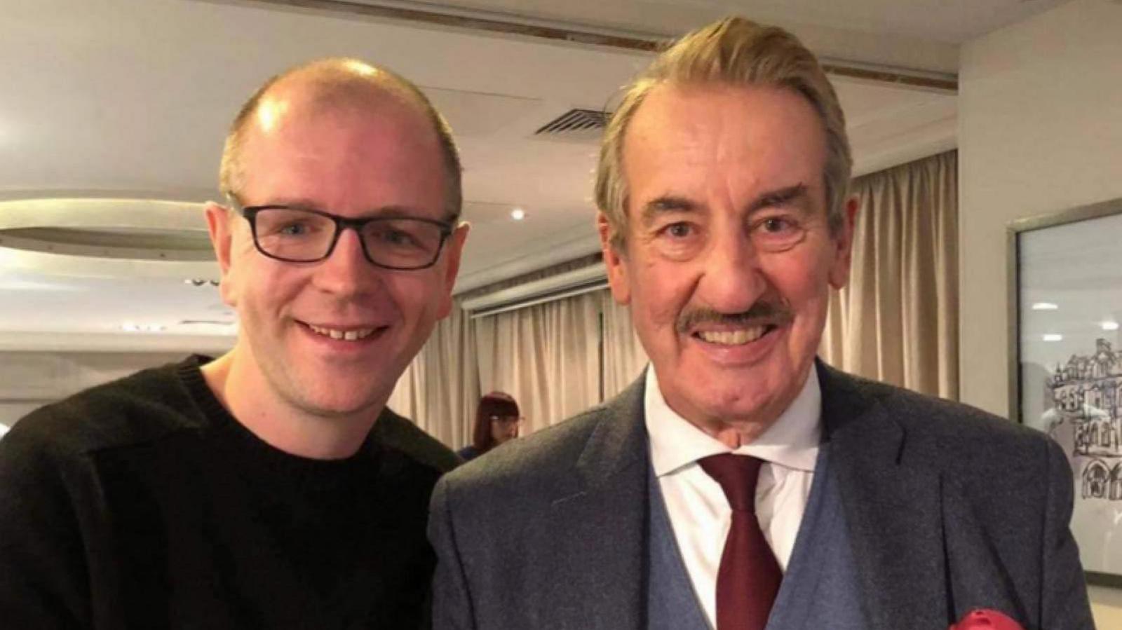 John Challis with a fan