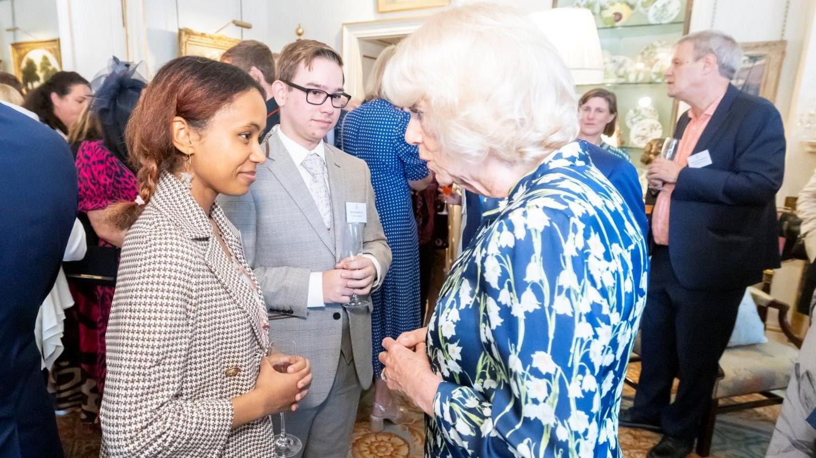 James and Alisha meeting the Queen