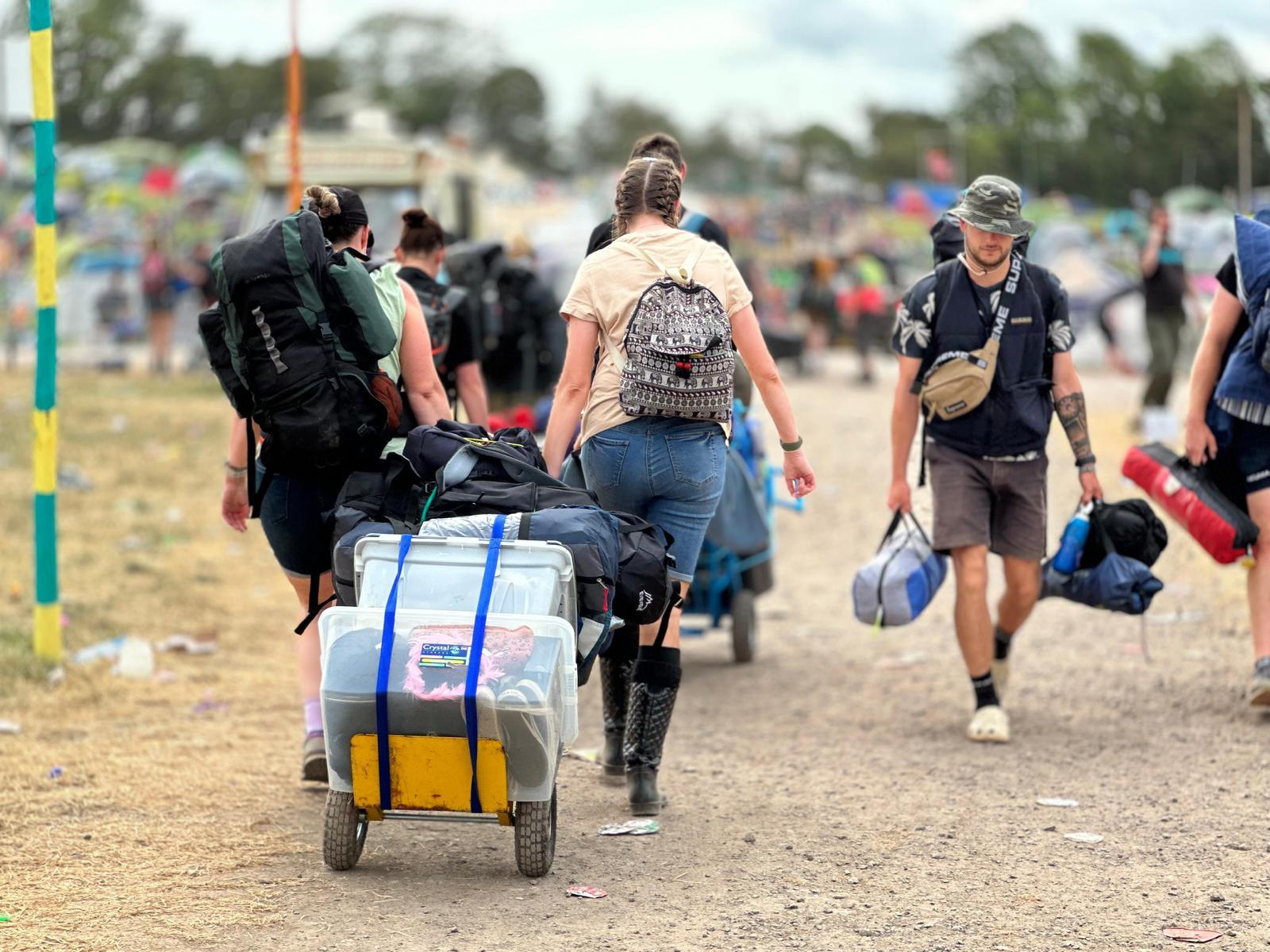 People leave Glastonbury Festival