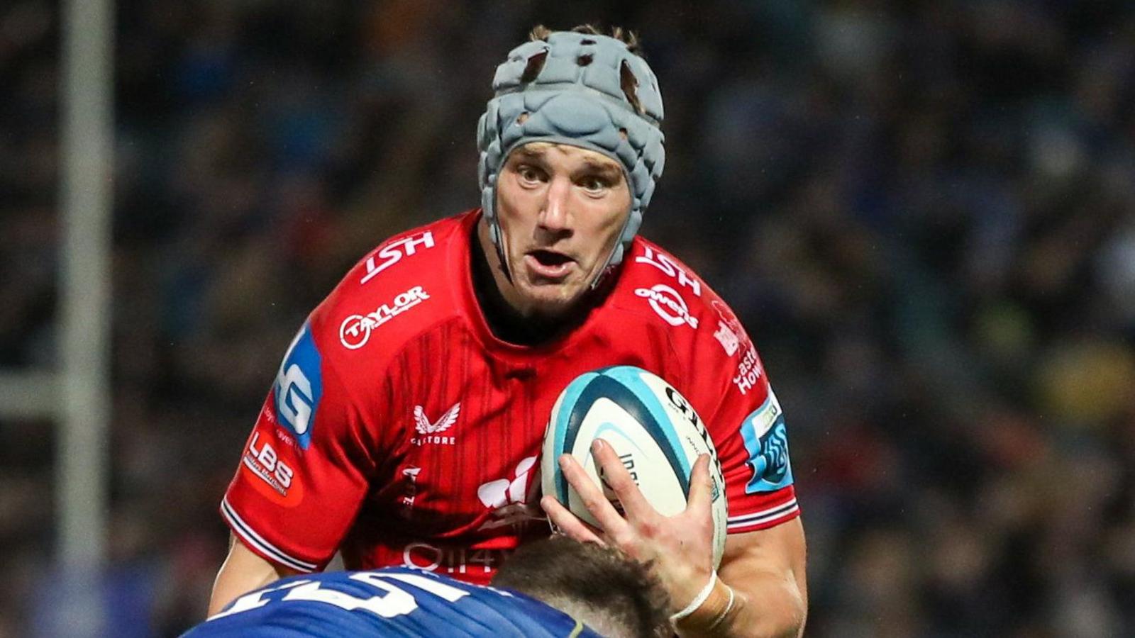 Jonathan Davies in action against Leinster