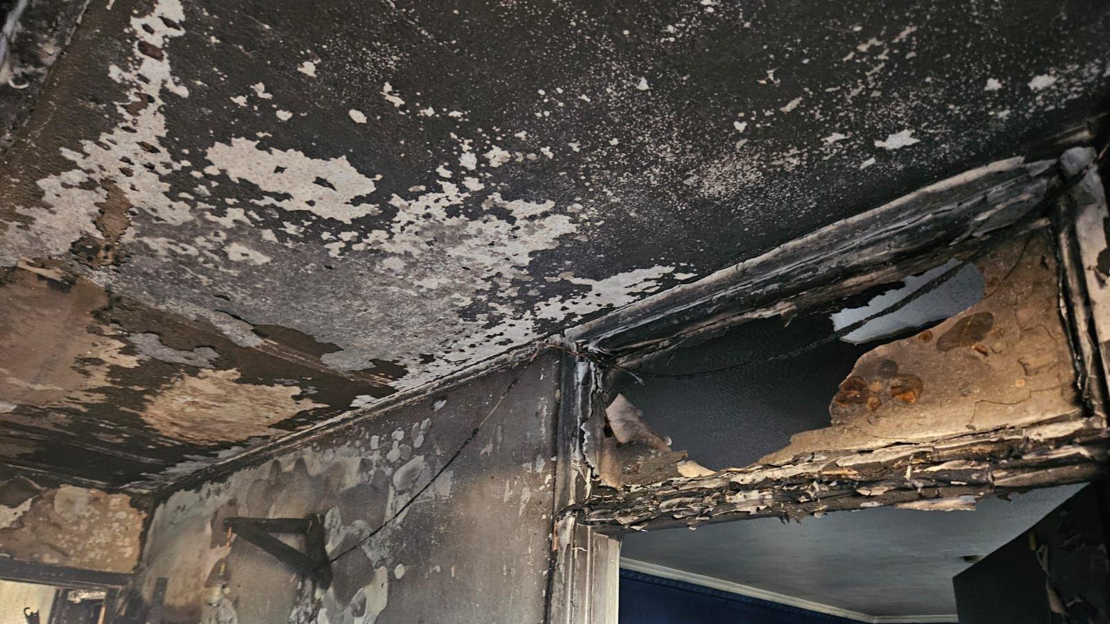 Fire damage to the ceiling of the house.