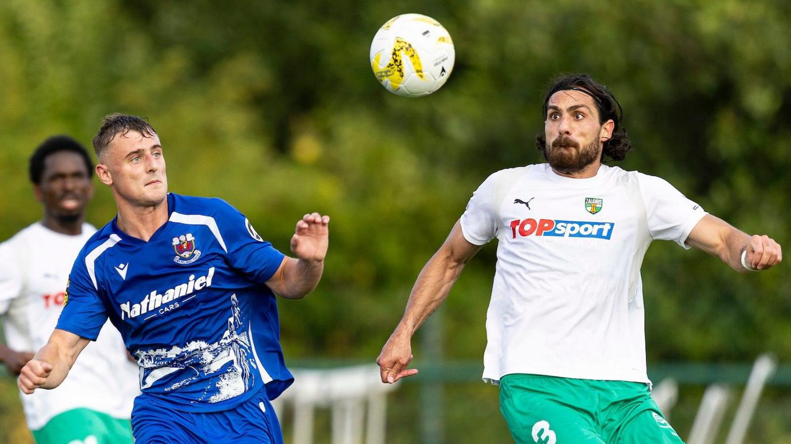 Noah Daley of Penybont in action against Anton Tolordava of Kauno Žalgiris.