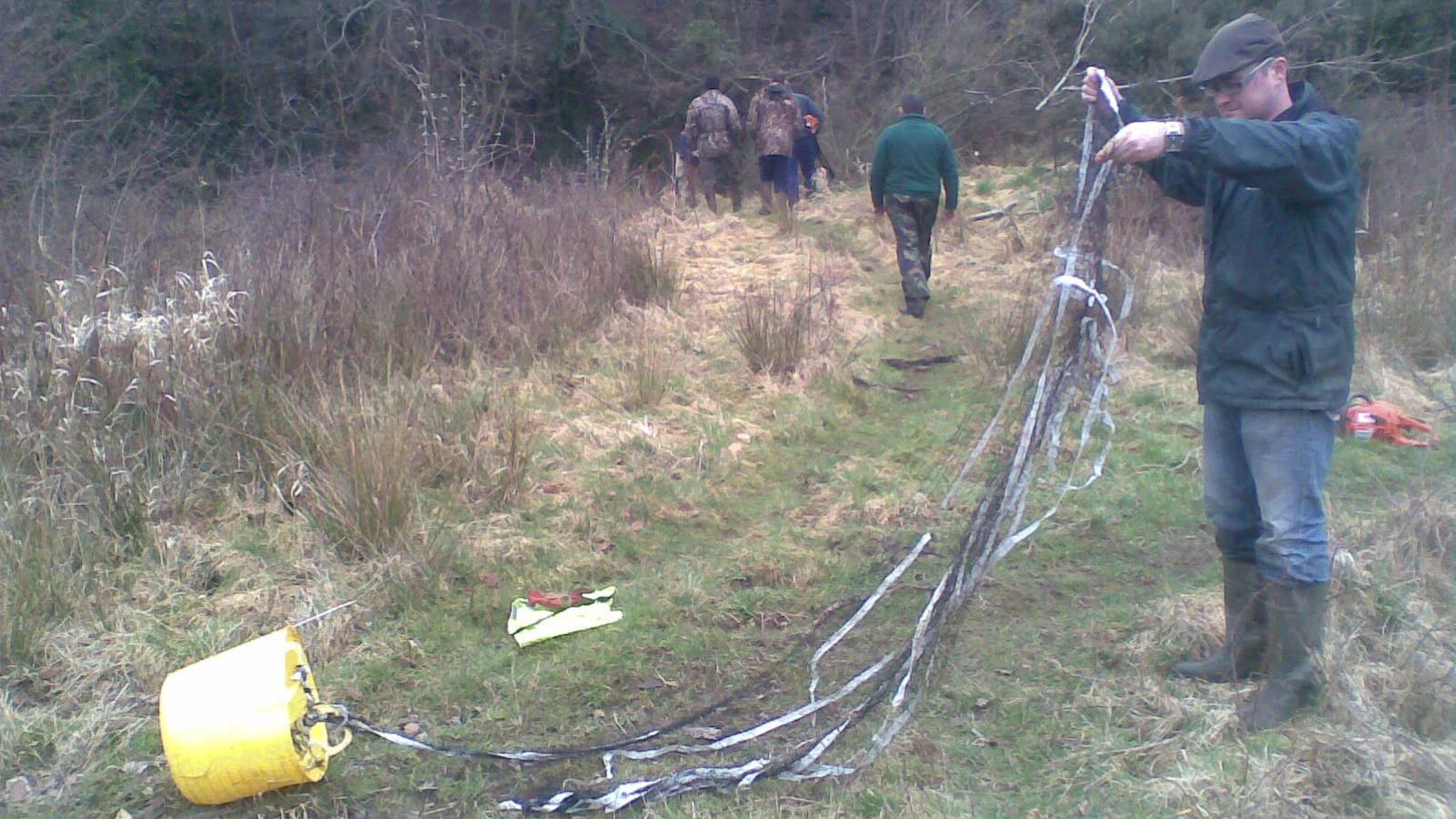 Badminton net pulled from river