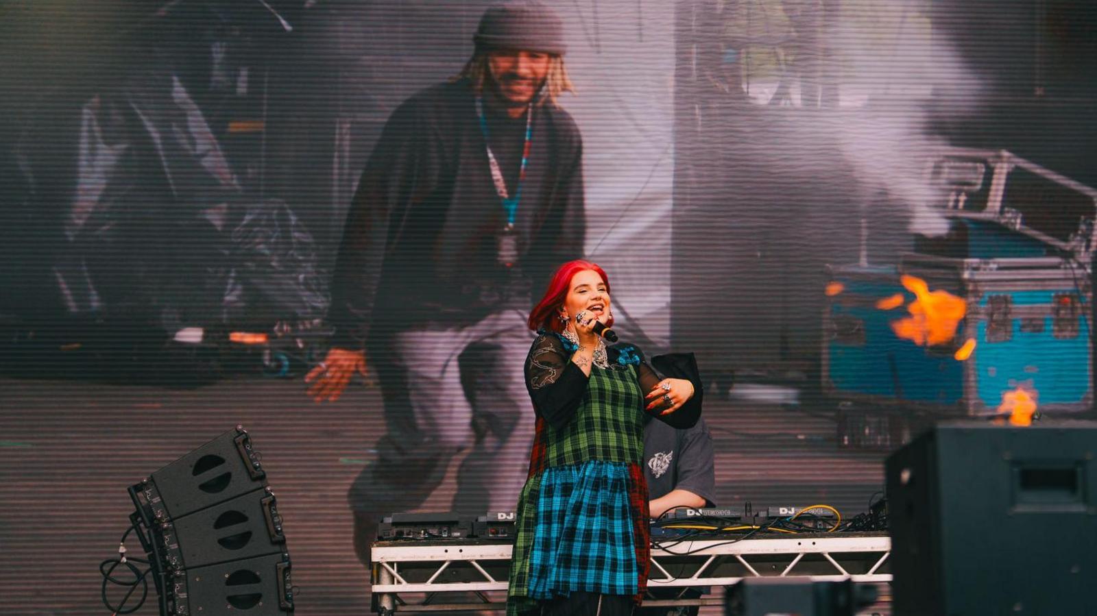 Performer on stage at Love Saves The Day in Bristol