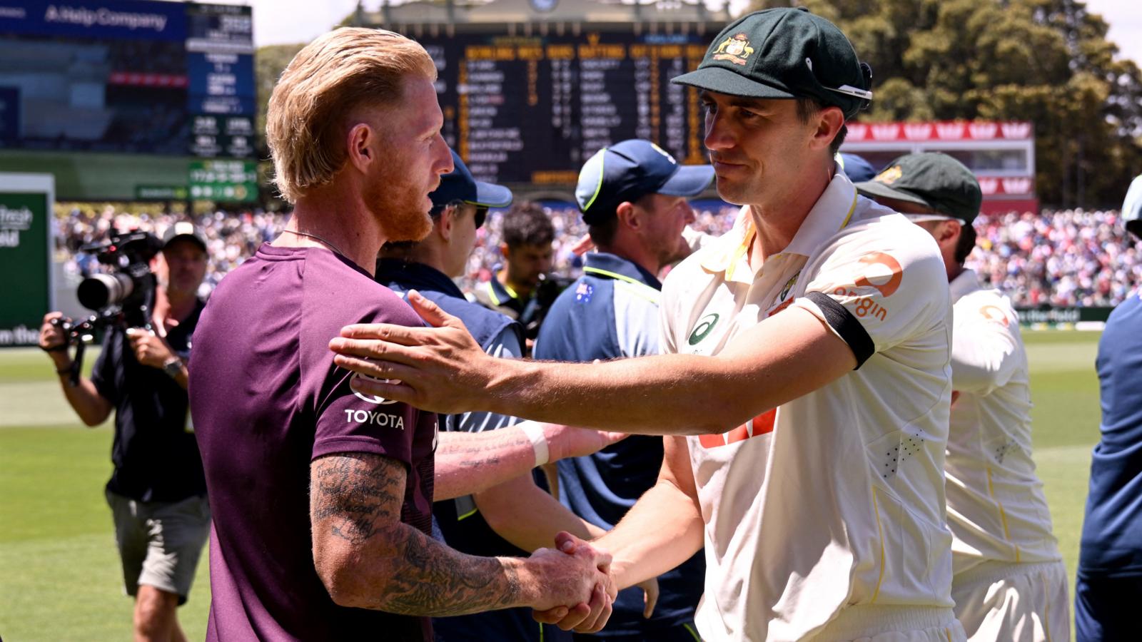 England captain Ben Stokes (left) shakes hands with Australia captain Pat Cummins (right)
