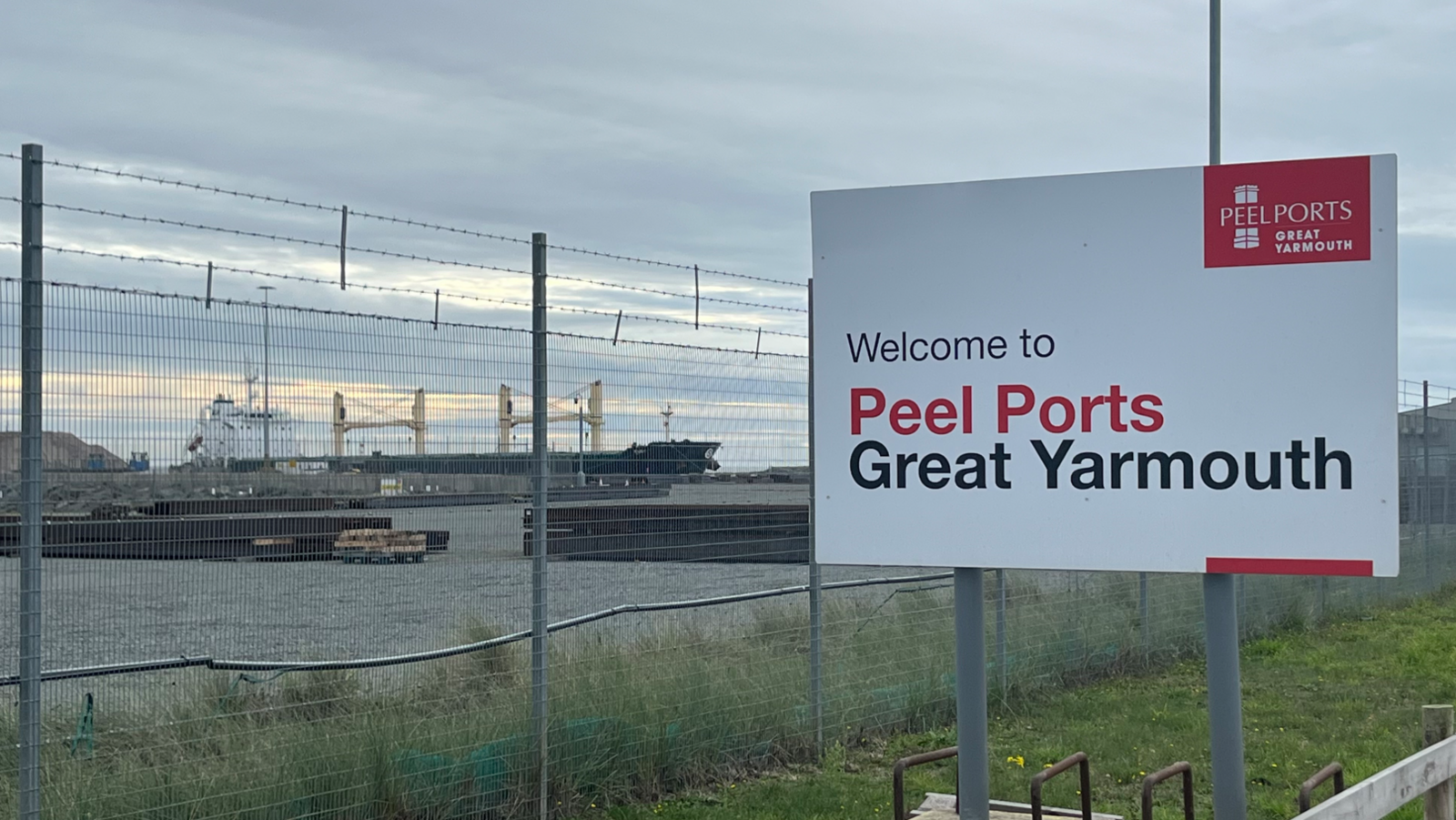 Peel Ports sign at Great Yarmouth with ships in the background