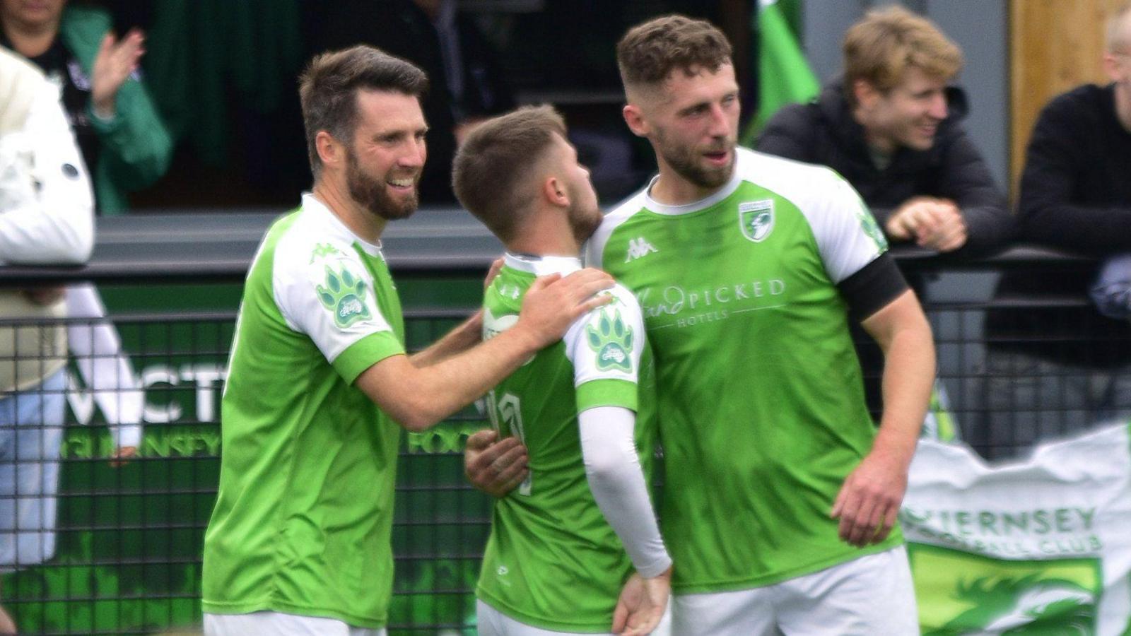 Ross Allen, Brandon Wallace and Sam Murray celebrate