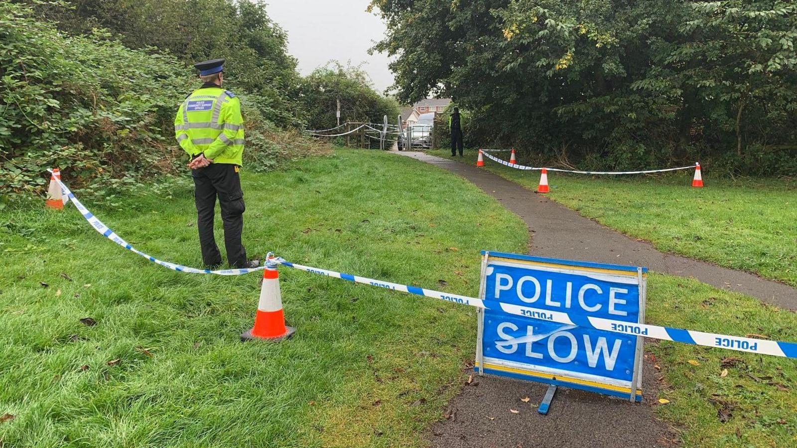 Police in a park after a serious incident