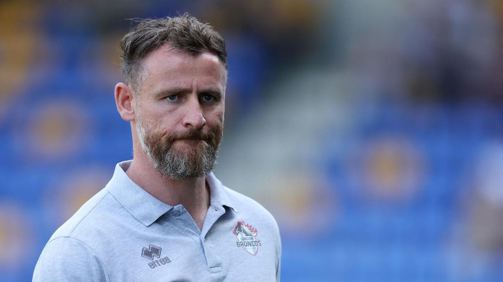 London Broncos head coach Mike Eccles looks on