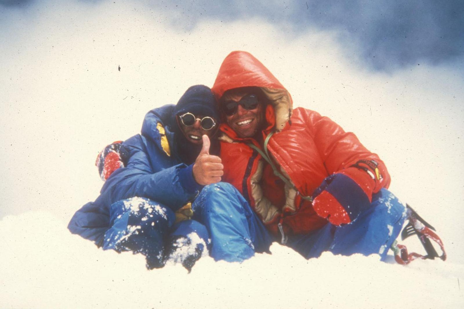 Vic Saunders (left) and Mick Fowler on the summit of Spantik in 1987, dressed in padded coats and sunglasses