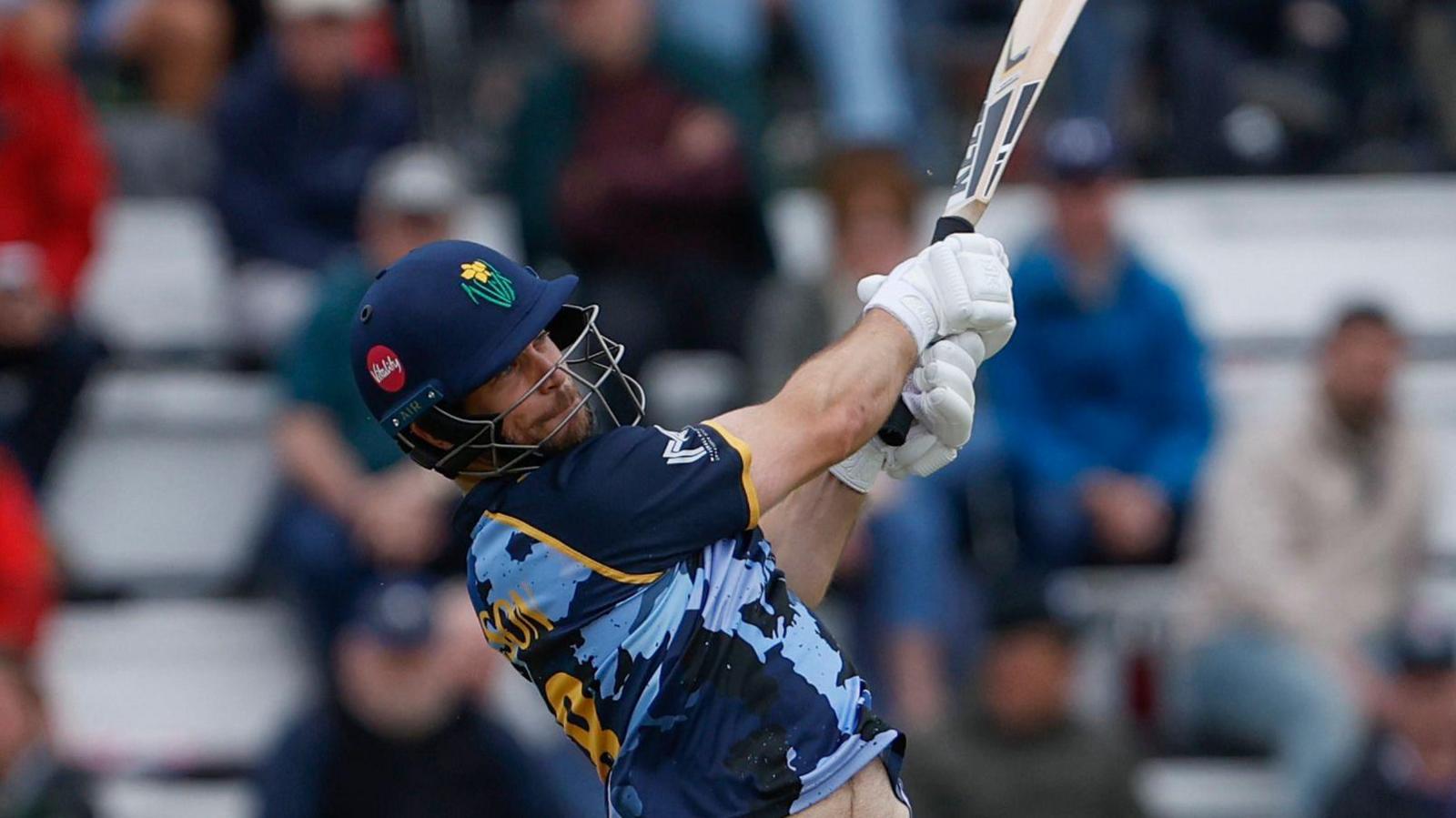 Sean Dickson hitting a shot into the off-side for Glamorgan.