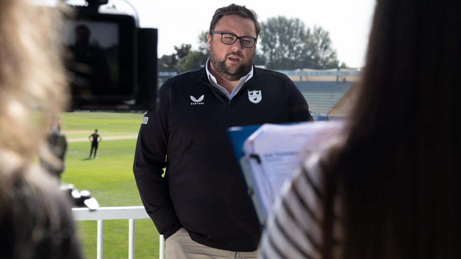 Worcestershire commercial director Joe Tromans faces a camera crew