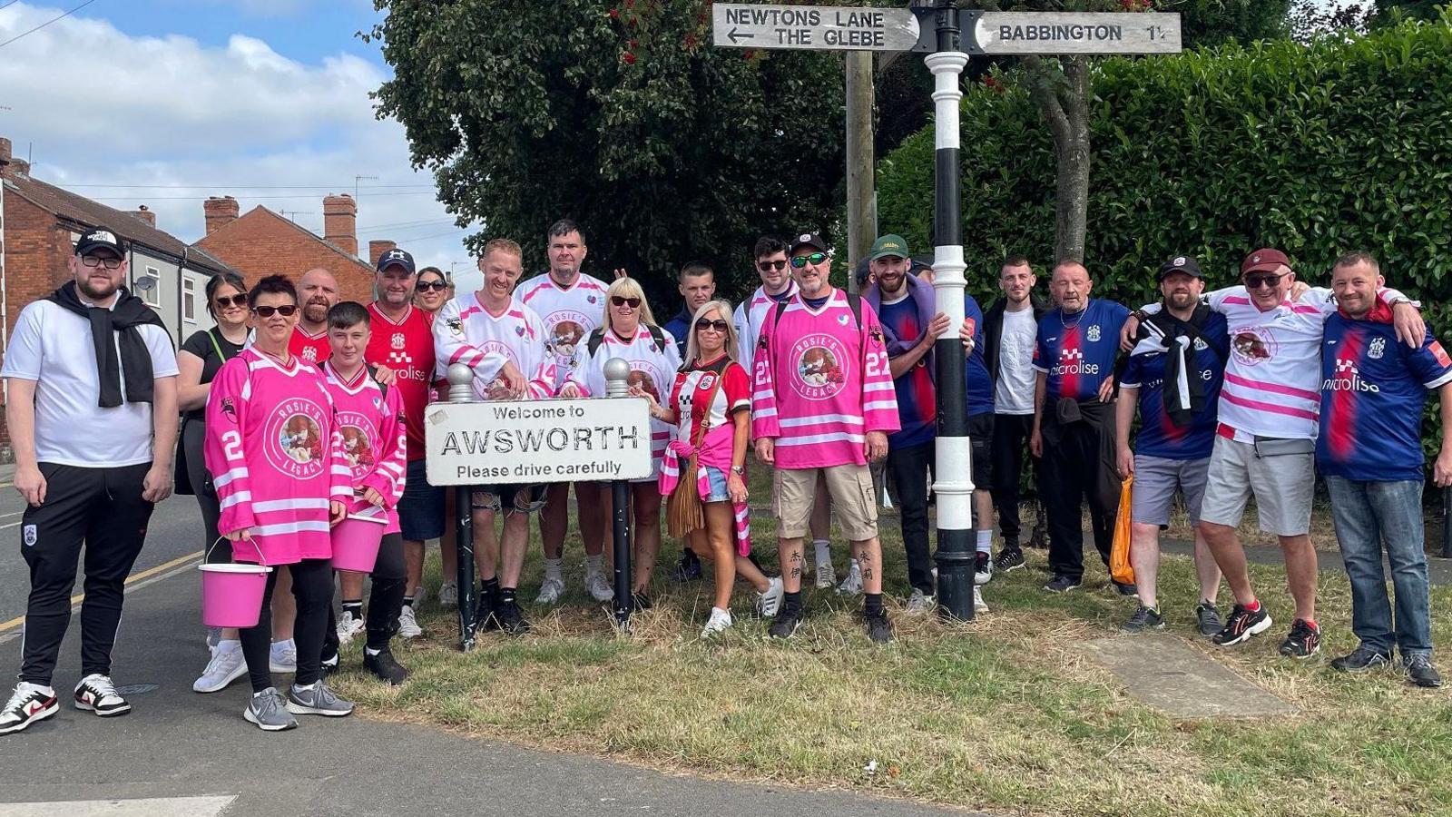 A group of fundraisers on a sponsored walk, gathered in Awsworth