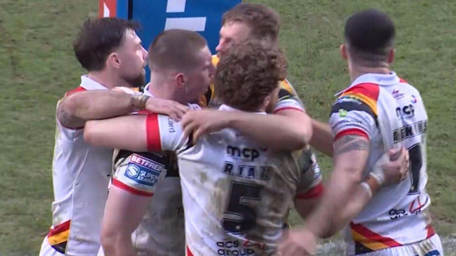Bradford Bulls celebrate scoring a try against London Broncos.