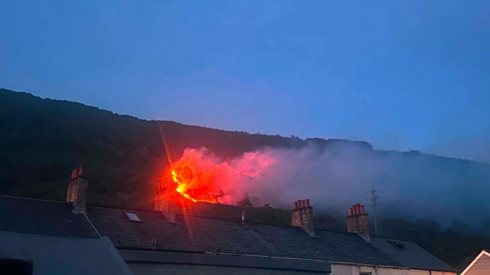 Wildfire at night above Cwmavon