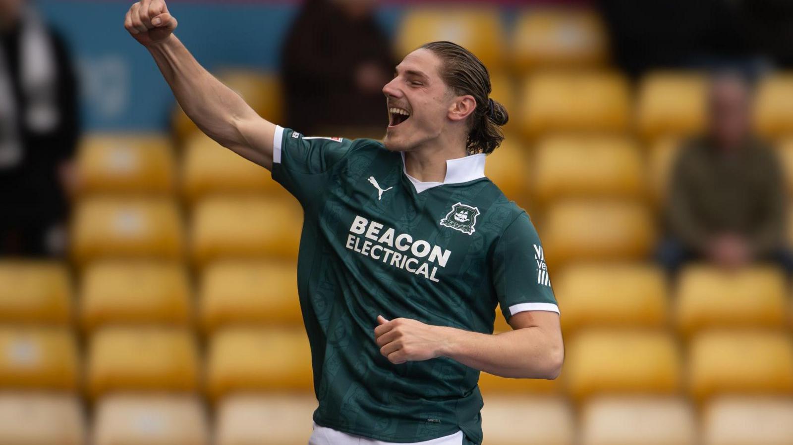 Lorent Tolaj celebrates by punching the air