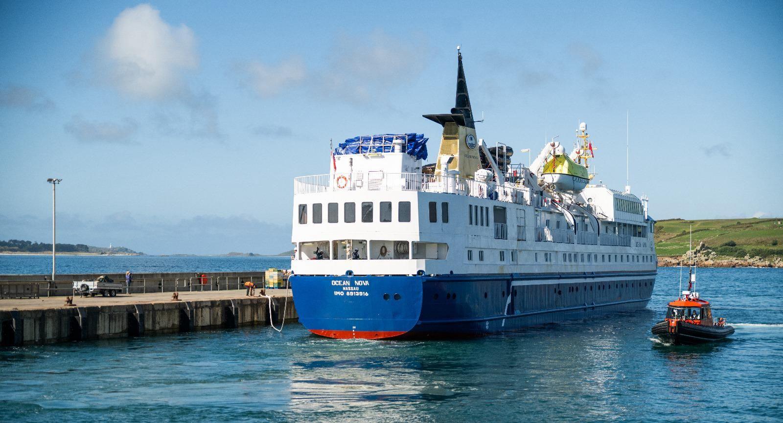 Ocean Nova, a large blue and white boat, docked at St Mary's Quay