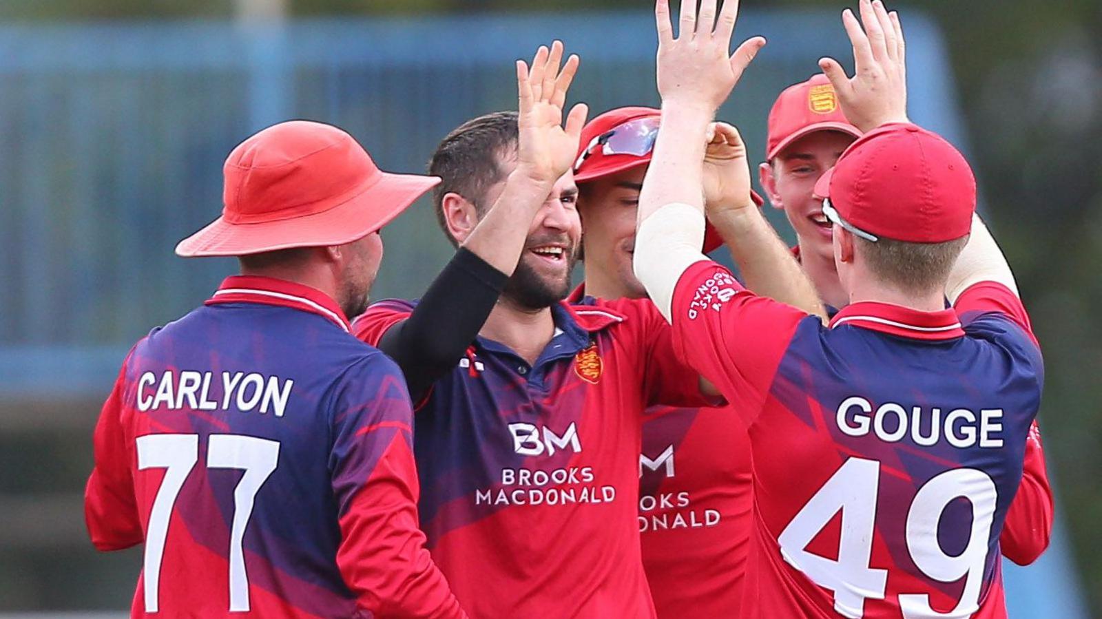 Jersey's cricketers celebrate a wicket