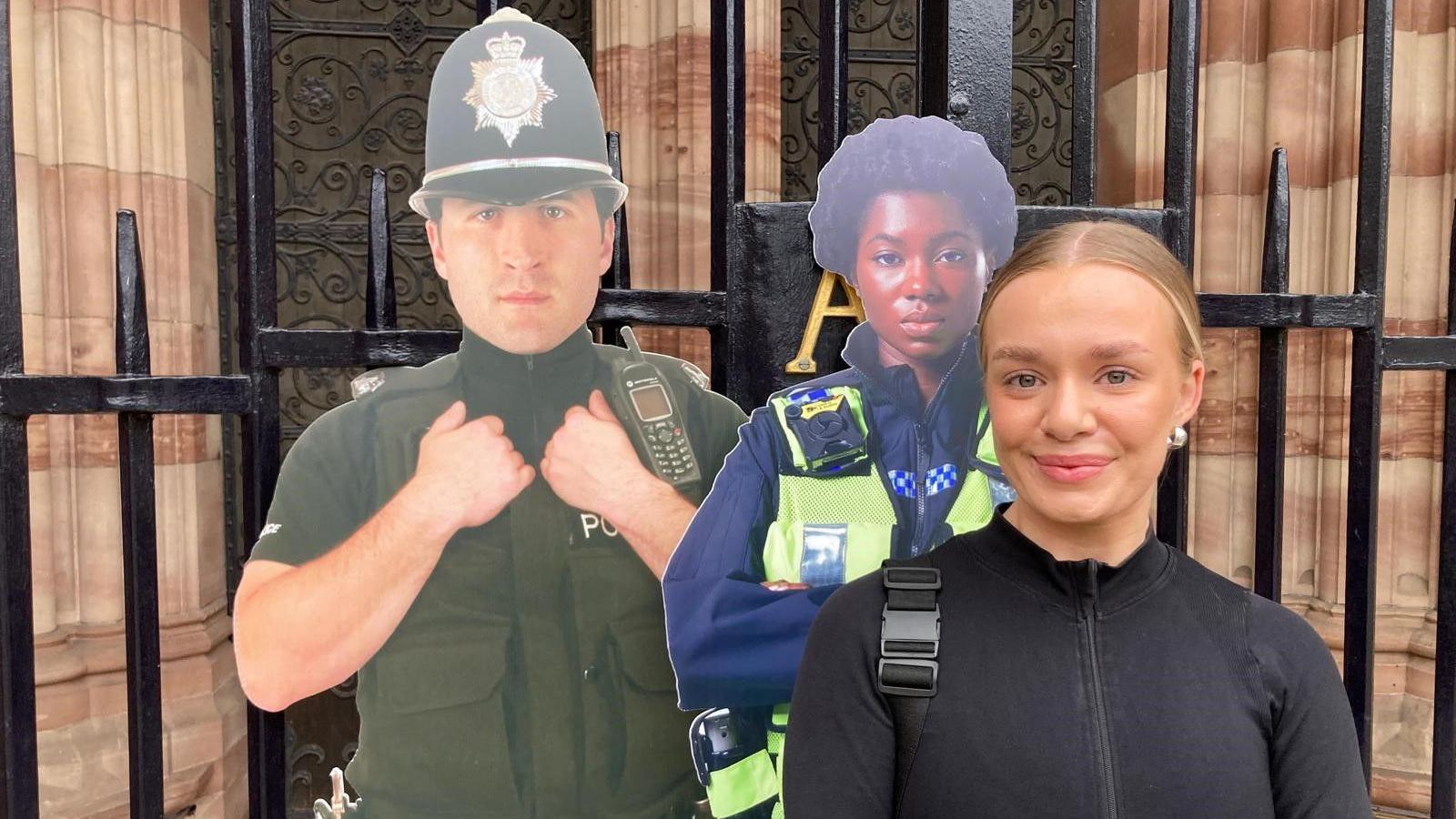 Morgan stands by two cardboard cut out police officers