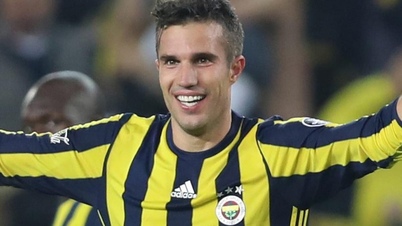 Robin van Persie celebrates scoring for Fenerbahce against Galatasaray.