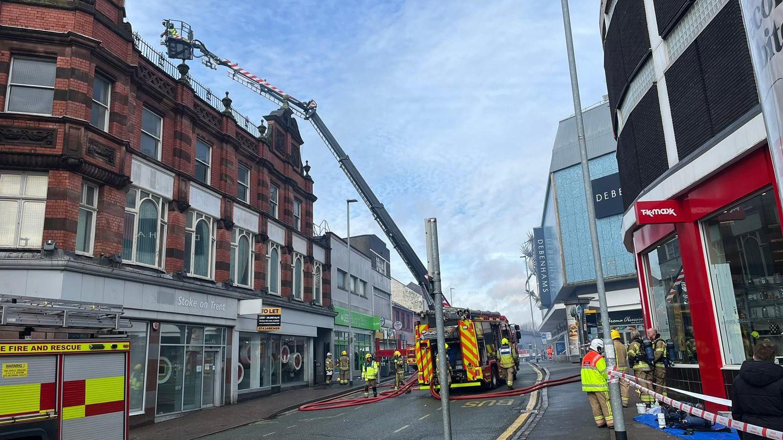 Fire crews inside the cordon in Hanley