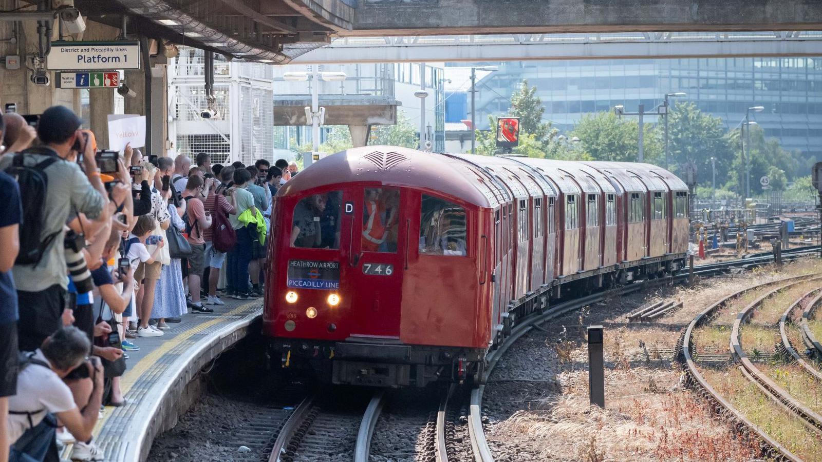 People looking at the train