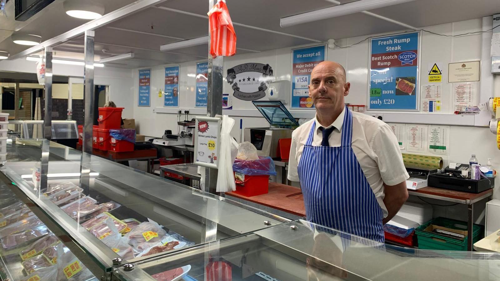 Butcher Andy Bowley behind his counter at Eastgate Indoor Market