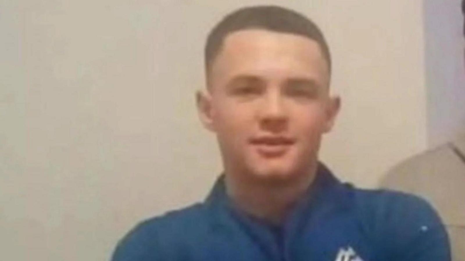 Harry Gilbertson, wearing a blue sports top, looks ahead in a photo