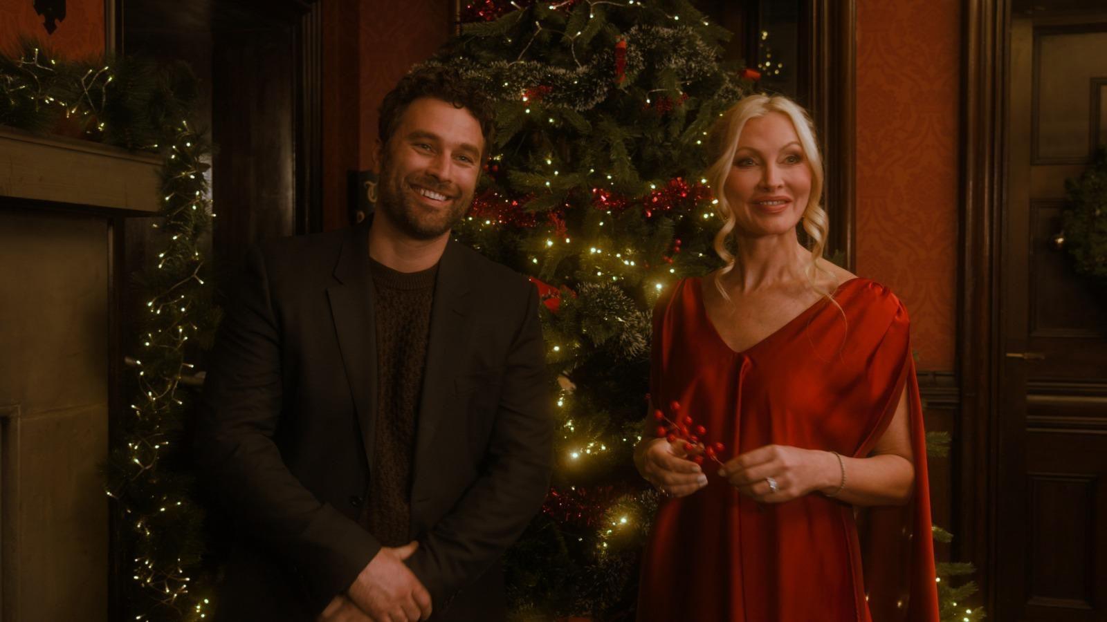 Actor Alex Trumble stands alongside Caprice in stills from the movie, featuring twinkly lights and a festive christmas tree.