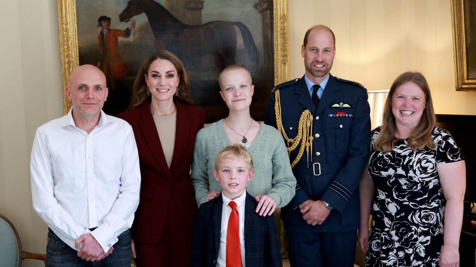 The Prince and Princess of Wales with Liz and her family