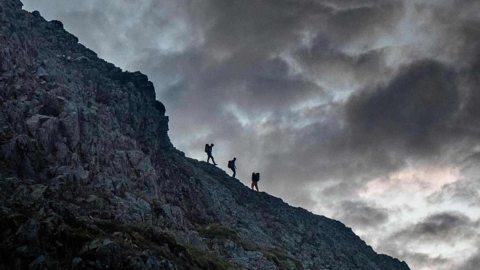 Three climbers on the mountainside