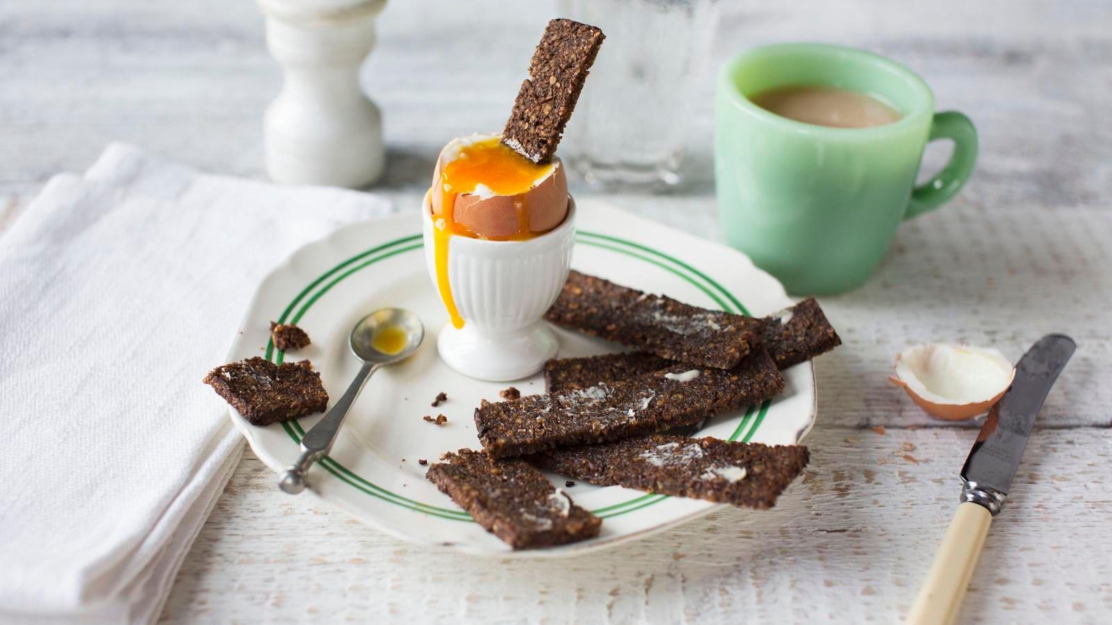 Boiled egg with rye bread soldiers