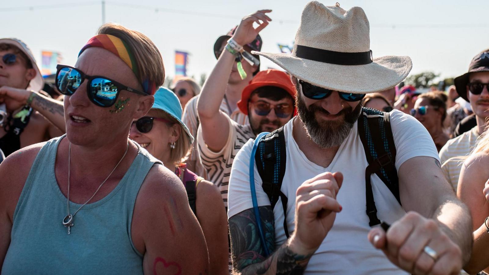 Two men dancing at the front of the crowd at Isle of Wight Festival