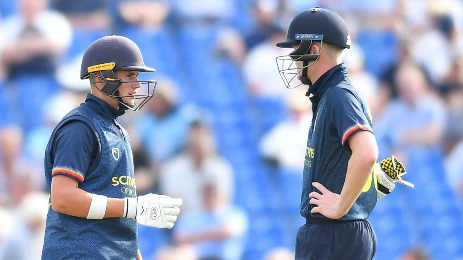 Jacob Bethell and Dan Mousley talk at the crease for Birmingham Bears