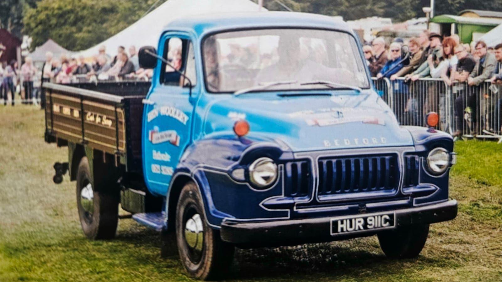 The image shows Ben in one of his first pick-up trucks 