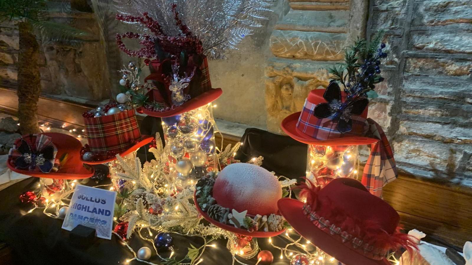 An array of hats worn by the Sollus Highland Dancers