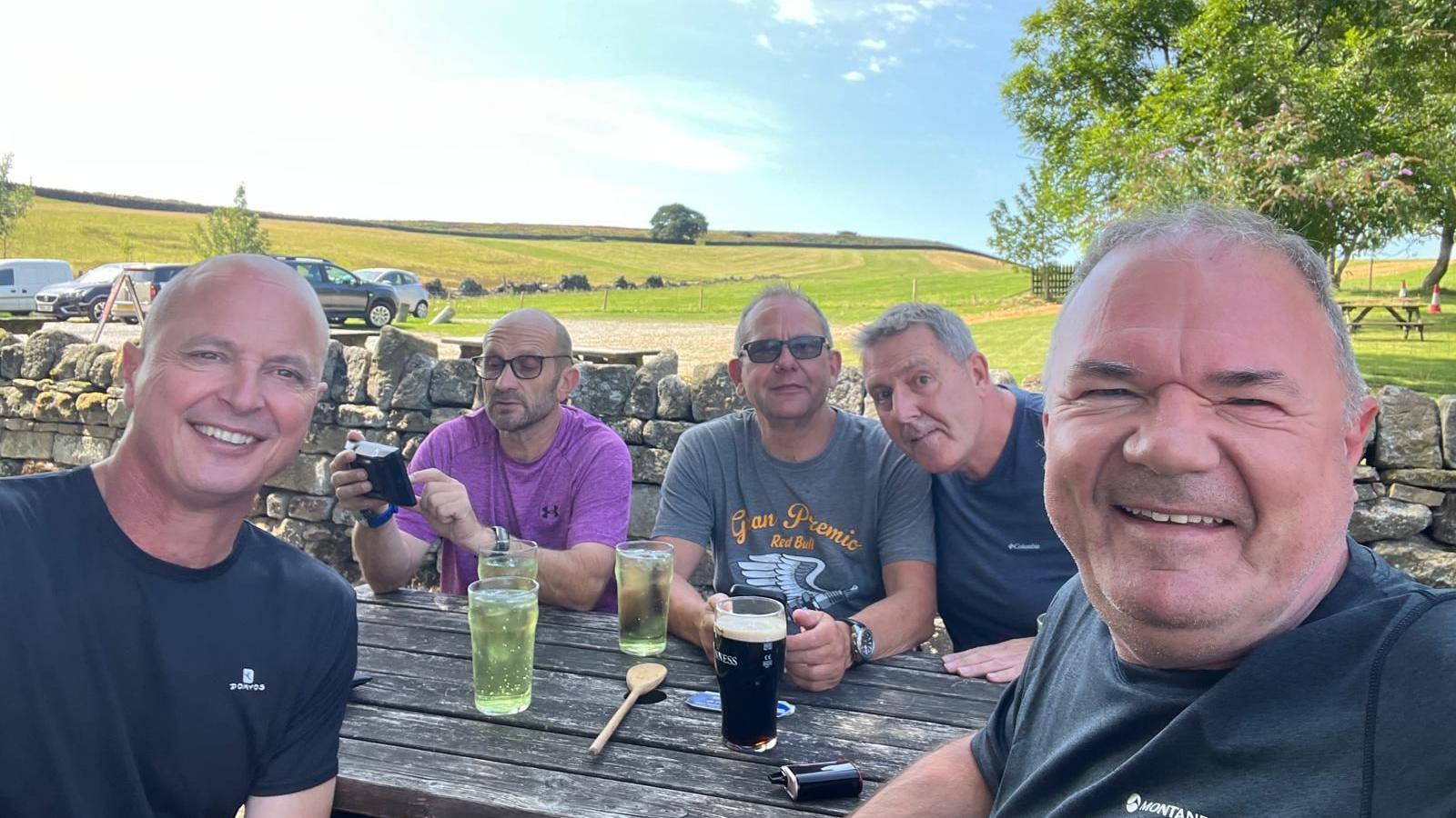 Julian Hall with friends at a pub in the Yorkshire Moors