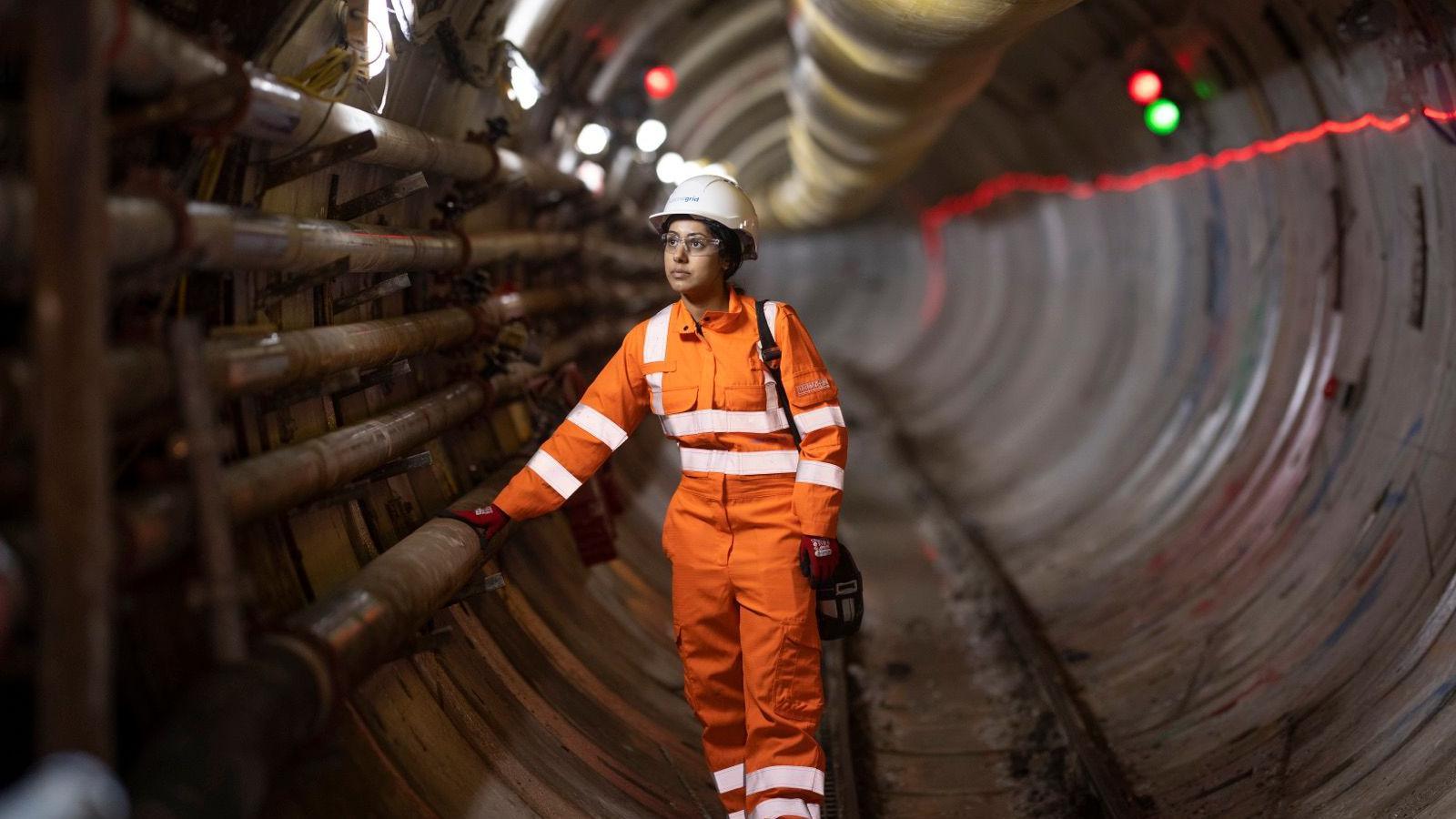 A female engineer in high viz protective clothing