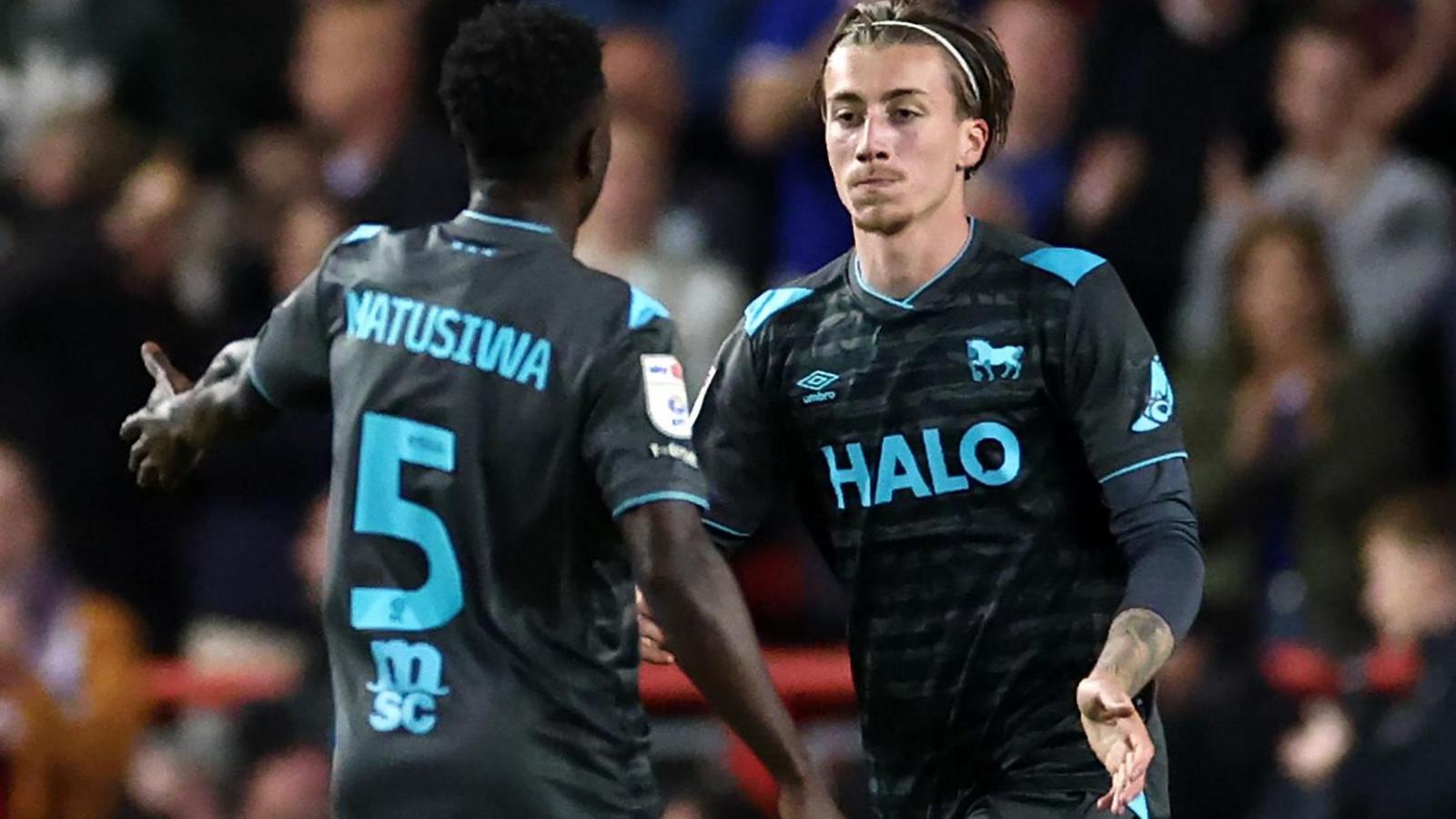 Jack Clarke runs towards team-mate Azor Matusiwa after scoring for Ipswich Town
