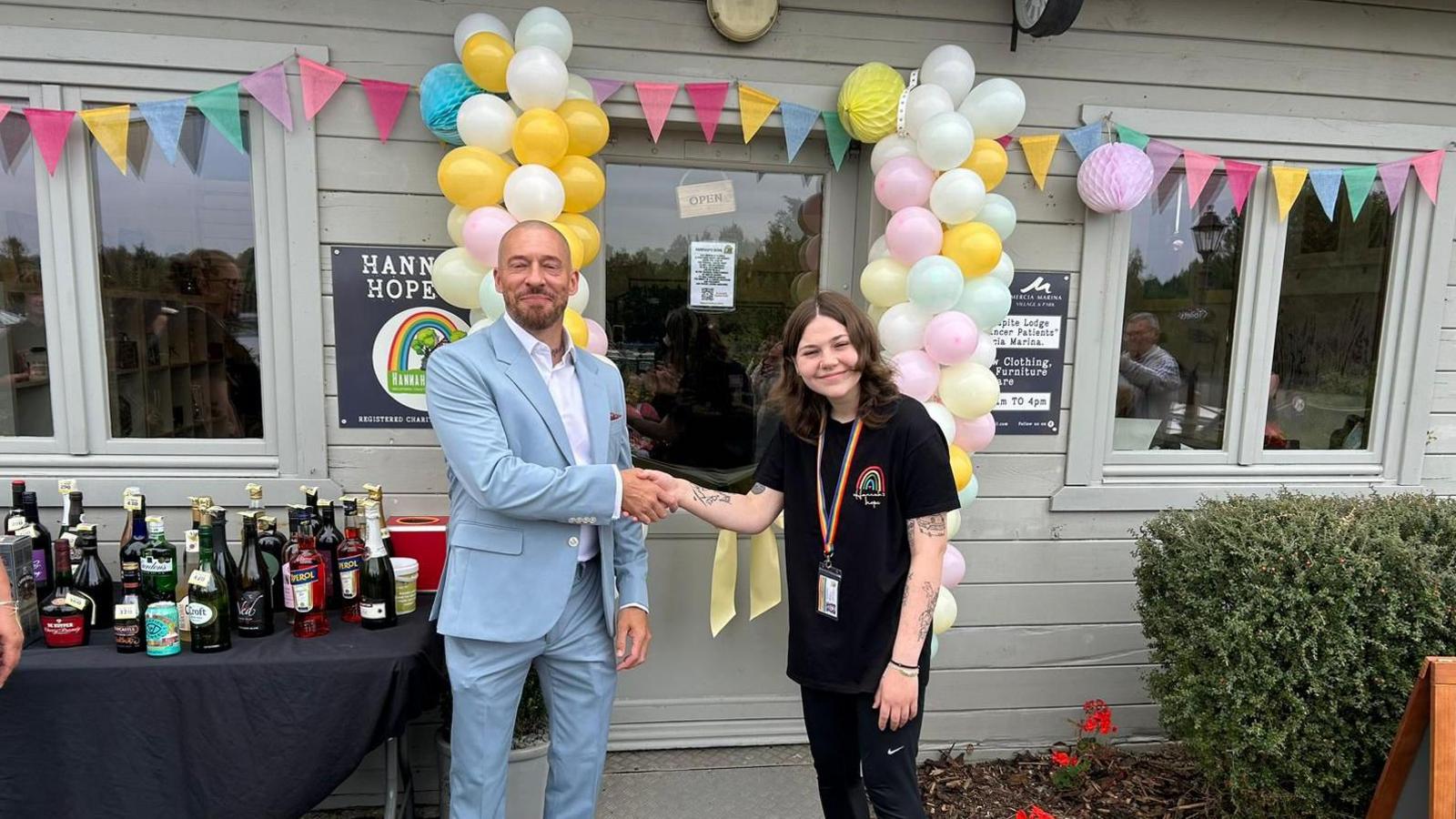 Tony and Hannah opening the shop