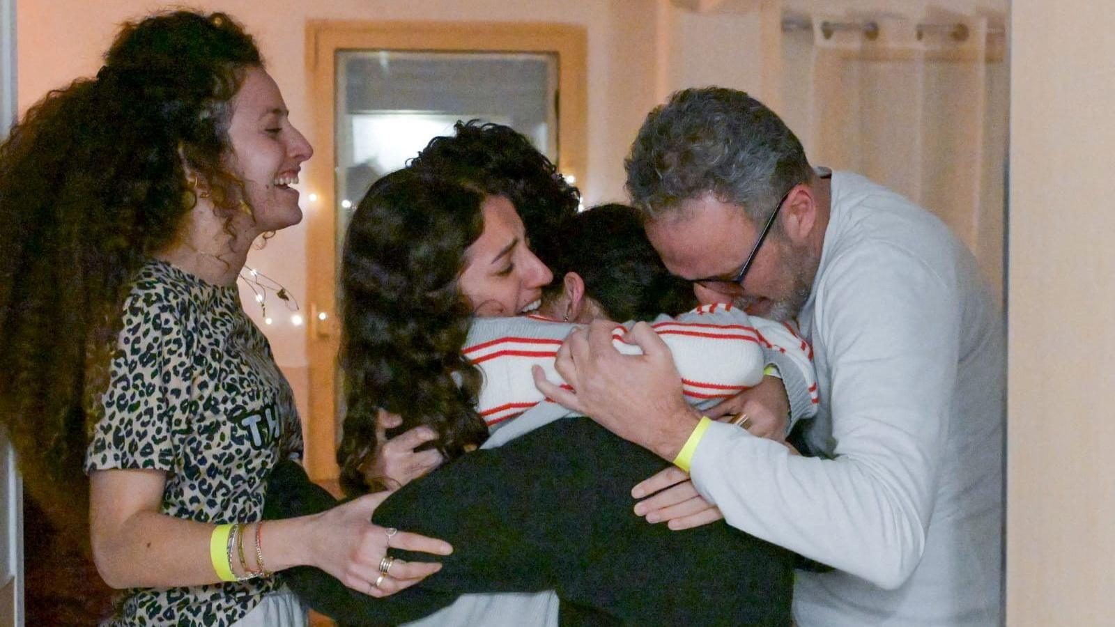 Released Israeli hostage Romi Gonen embraces loved ones at Sheba Medical Center near Tel Aviv, Israel, after being exchanged by Hamas for Palestinian prisoners (19 January 2025)